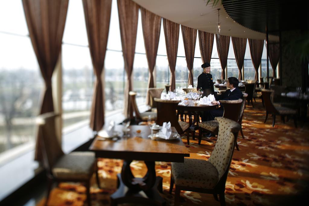 New Century Grand Hotel נינגבו מראה חיצוני תמונה